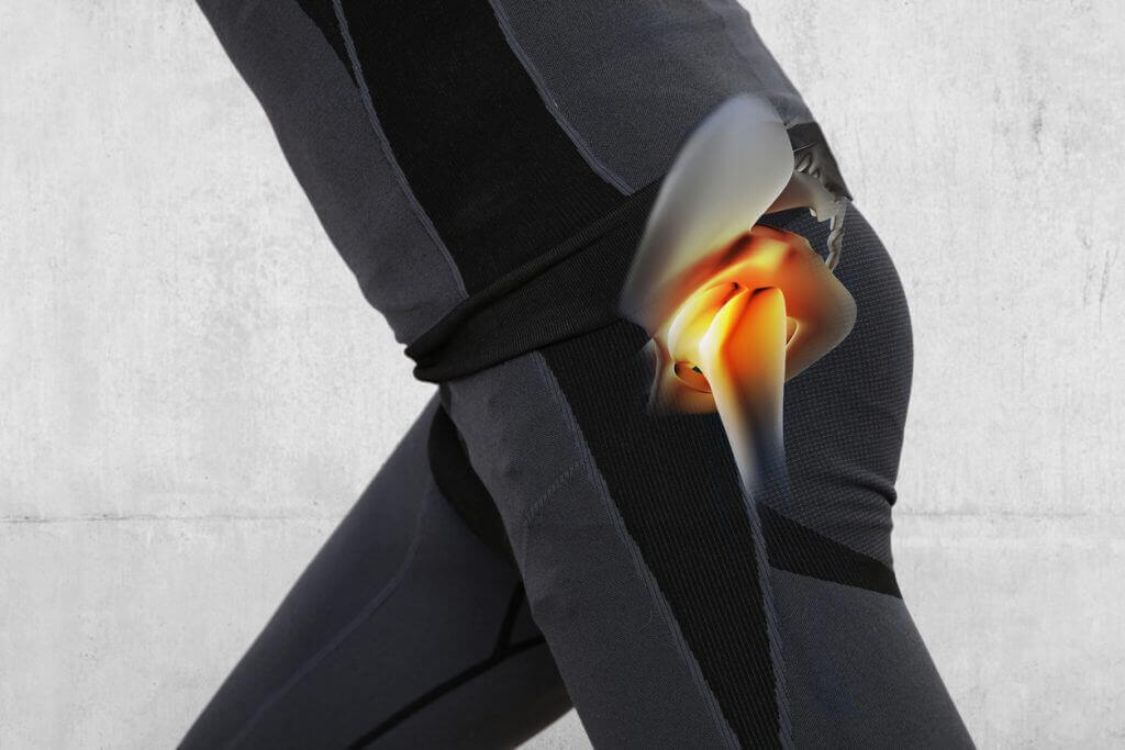 Man with hip joint pain. Sport exercising injury
