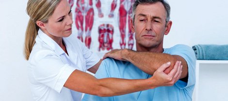 doctor with patient, doctor gripping elbow